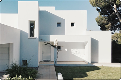 Modern white house with garden